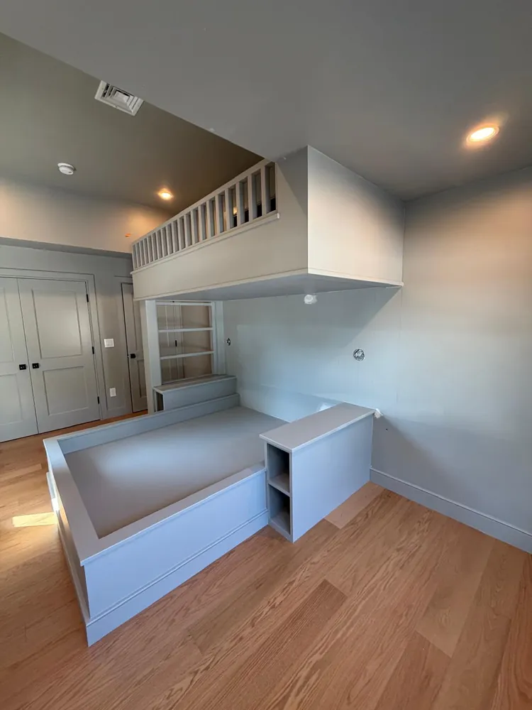 Custom built-in loft bed with smooth painted finish