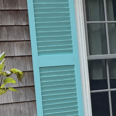 Freshly stained golden brown wood deck showing rich grain detail