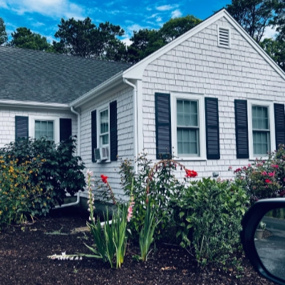 Freshly painted home exterior showing detailed trim work