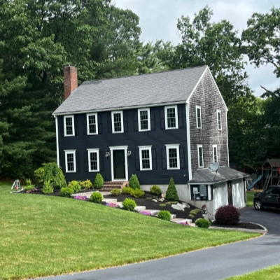 Painters applying Sherwin-Williams premium exterior coating