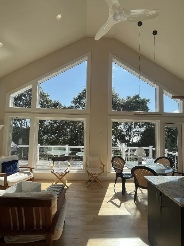 Professional painter carefully painting interior trim with a brush